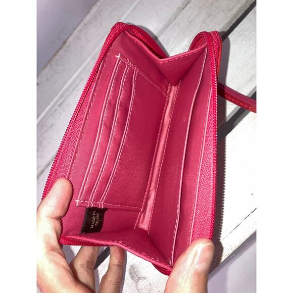 COACH SMALL TAN CANVAS SIGNATURE AND PINK LEATHER WRISTLET - Picture 7 of 9